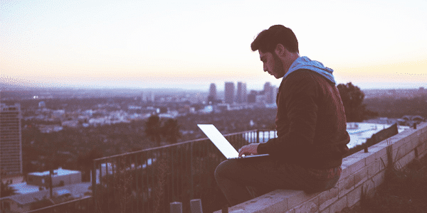 Working outside open space with a laptop